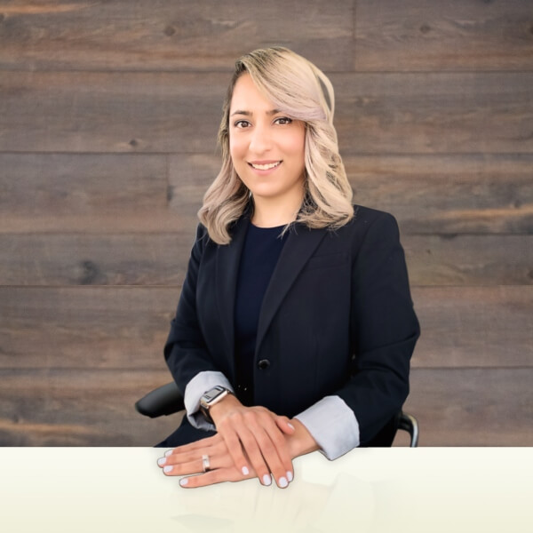 professional woman sitting at desk in office